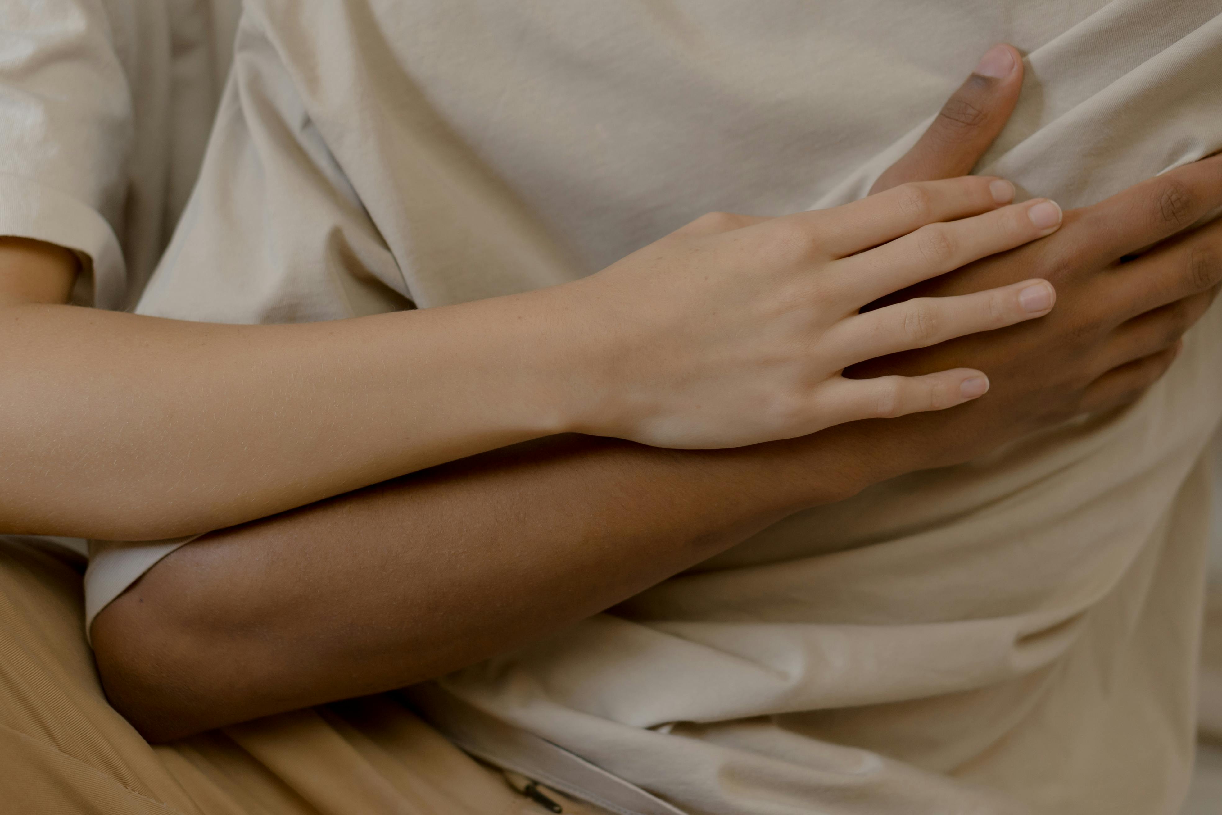 Image showing two people's arms close together